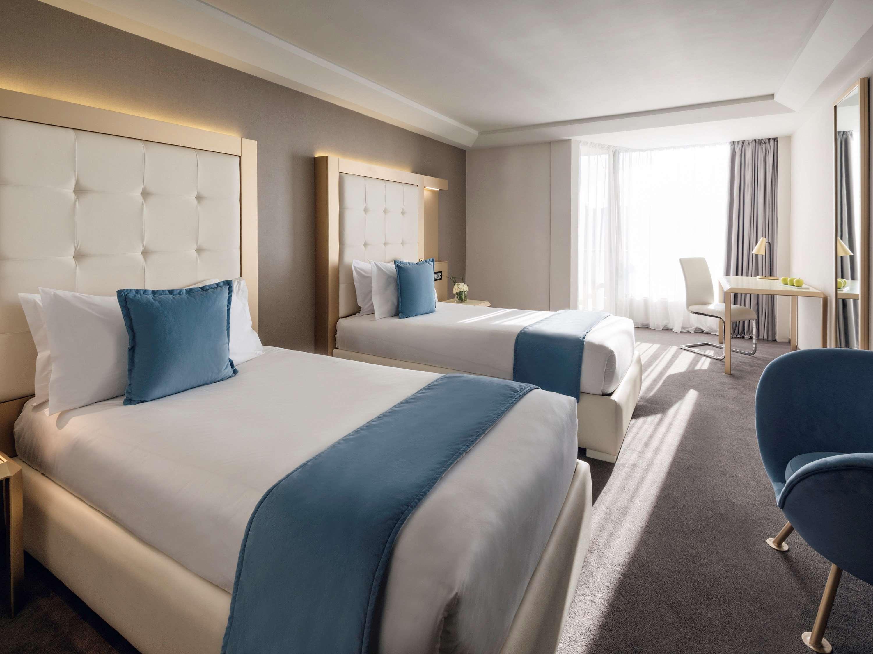 Moevenpick Hotel & Casino Malabata Tanger Exterior photo A room at the hotel
